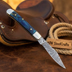 Custom Damascus Trapper Folding Knife – Blue Pakka Wood