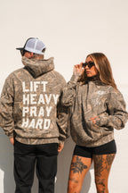 Lift Heavy. Pray Hard. - Premium Deadwood Camo Hoodie