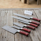 7-Piece Kitchen Knife Set with Vegetable Cleaver with Red Pakka Wood Handles and Swirl Damascus Blades
