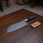 7-Inch Forged Damascus Cleaver Knife — Twisted Pattern Blade, Grey Pakka Wood Handle, Steel Bolster & Hanging Hole | JW Steel Crafts